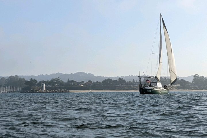 a small boat in a large body of water